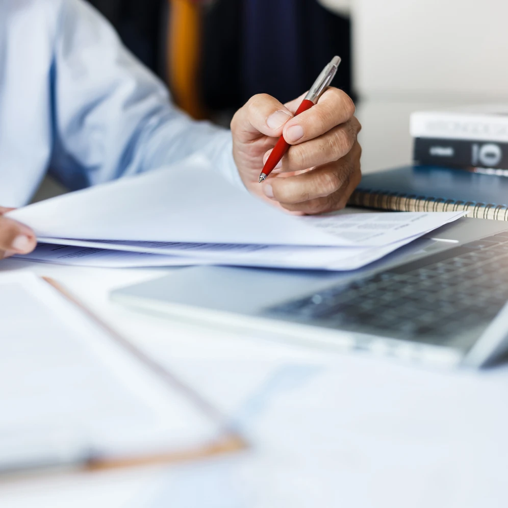 An individual drafting documents naming Stifel Trust.