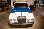 Stifel Venture Banking Banner draped across vintage car